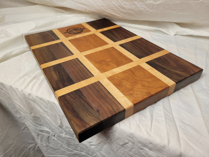 Walnut, maple, and cherry Cutting board